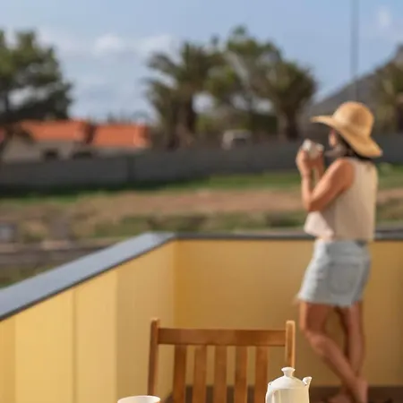 La Maison Doree By An Island